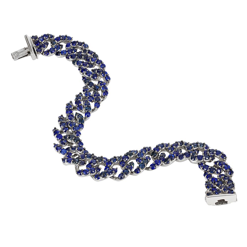Mixing black diamonds, white diamonds and blue sapphires never felt so good