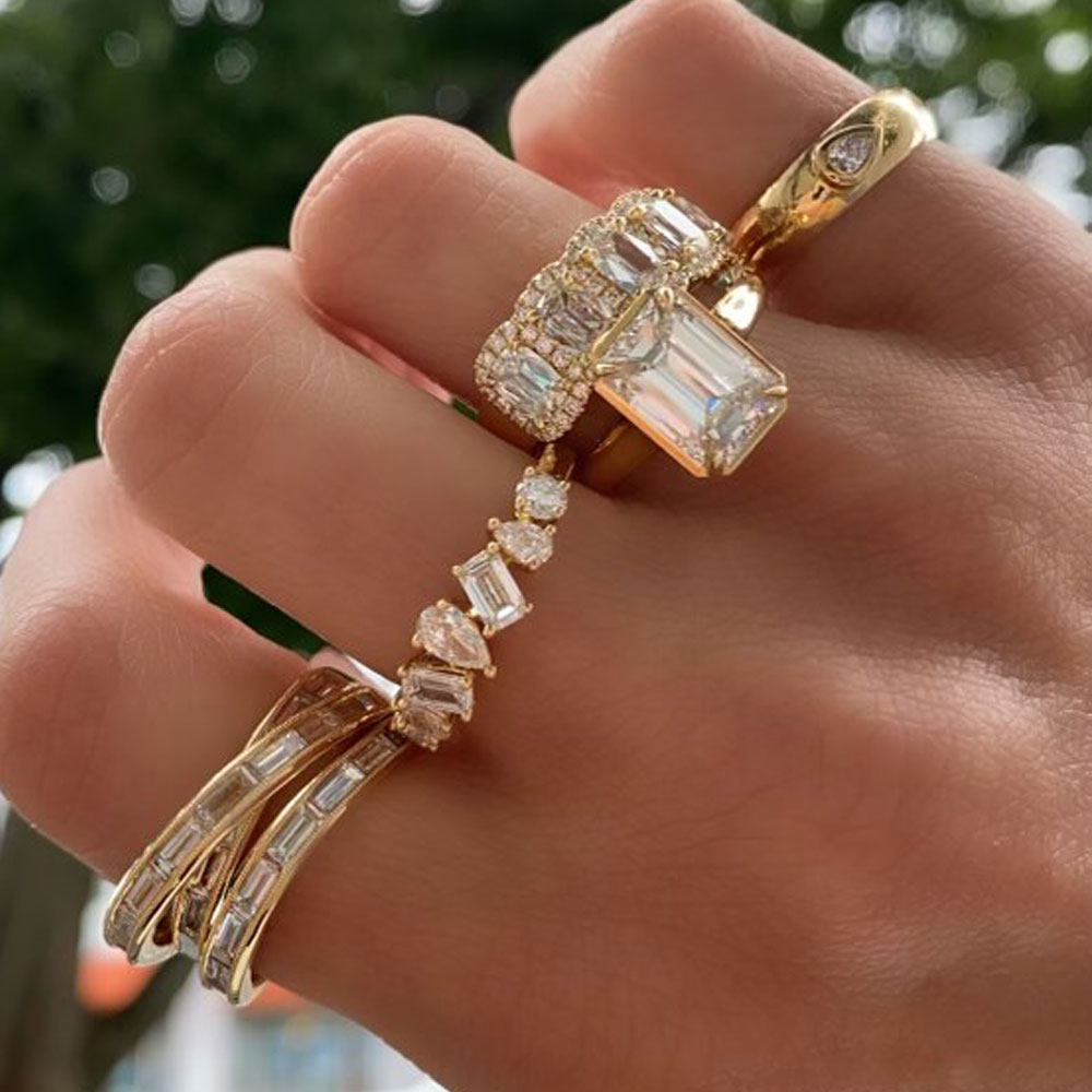 Yellow Gold and Diamond Rings All So Different But Mix Well Together