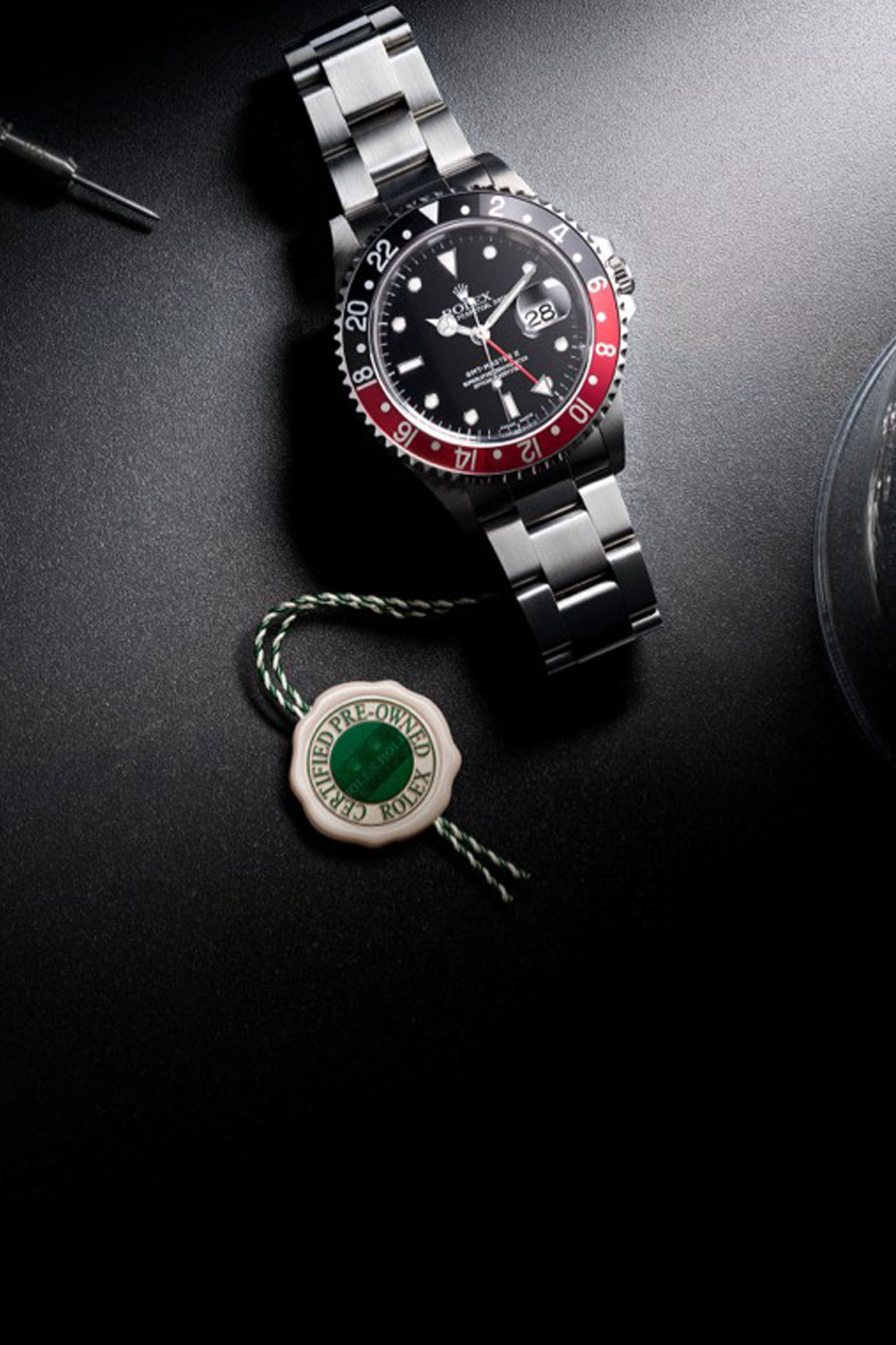 Men's luxury gifting lifestyle imagery with watches, jewelry, and personal objects